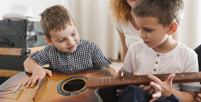 Improve Eye-hand Coordination Through Guitar Lessons for Kids